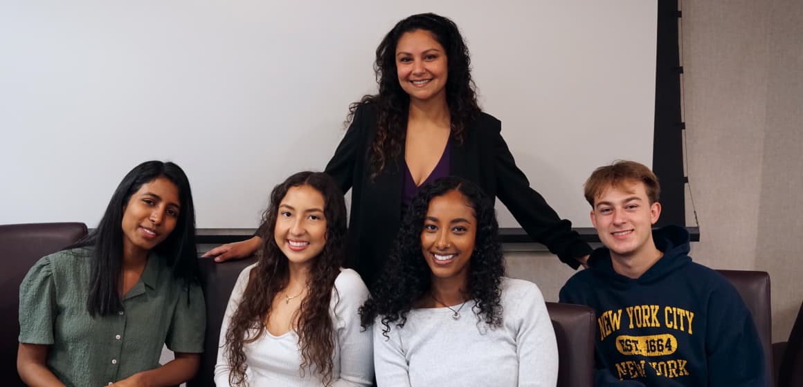 Group photo of students with instructor